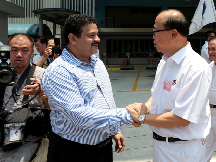 PAP’s David Ong (right) with independent candidate Samir Neji on Nomination Day. Mr Ong won Bukit Batok SMC, where Mr Samir garnered 150 votes. Photo: Jason Quah
