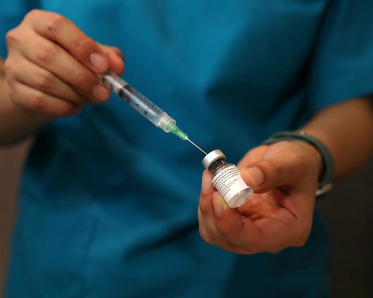 Australia returns around 500,000 Pfizer Covid-19 vaccine doses to Singapore