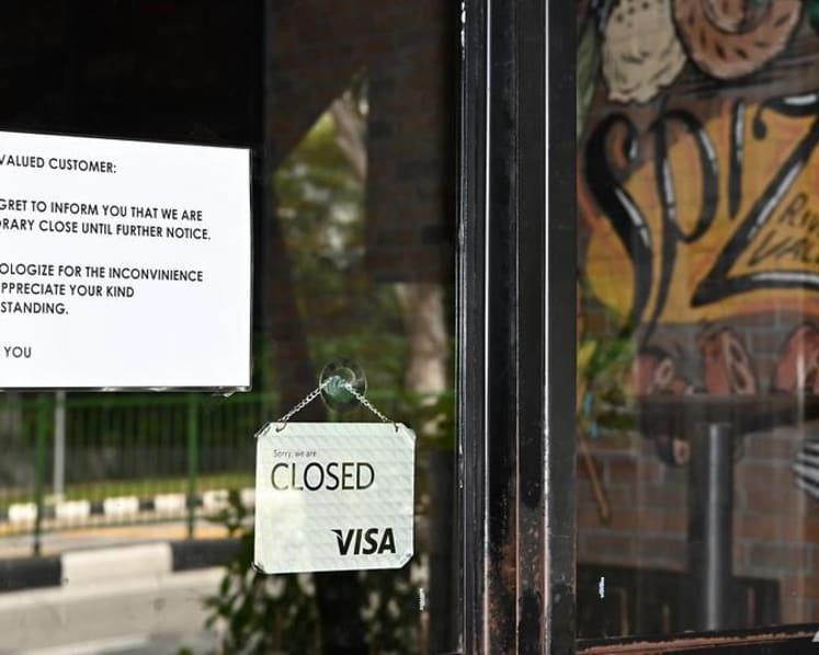 Eating Spize bento meal hours after preparation may have led to SATS officer's death, coroner's court hears