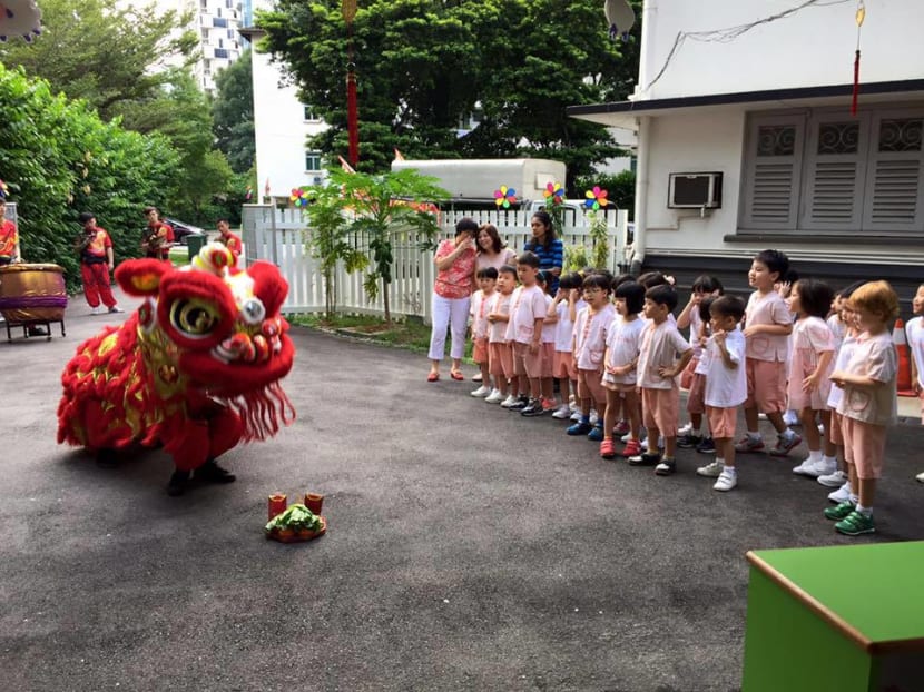 Children at Gracefields Kindergarten watching a Lion Dance show. Photo: Gracefields Kindergarten's Facebook page