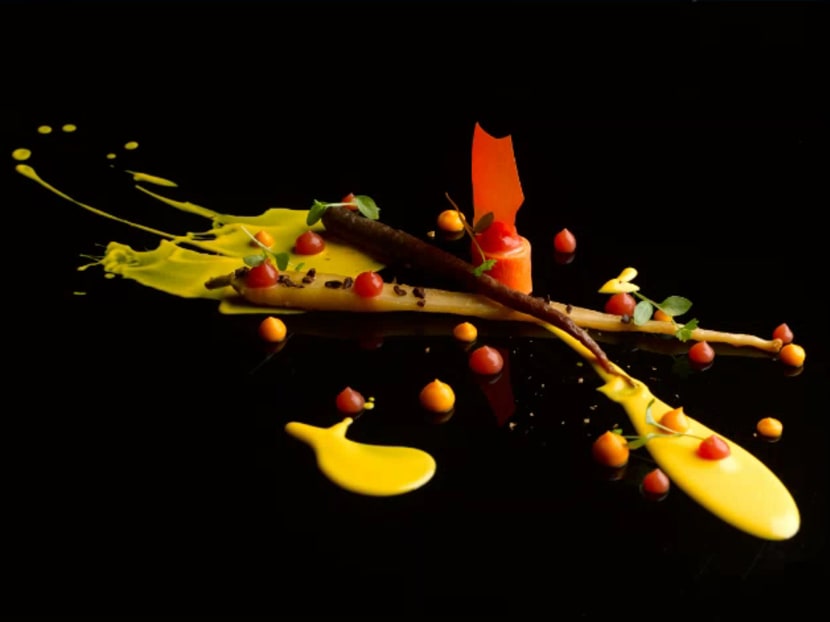 Carrots are prepared several ways  — pureed, roasted and dehydrated — and flavoured with cocoa nibs and tonka beans. Photo: Edmond Ho