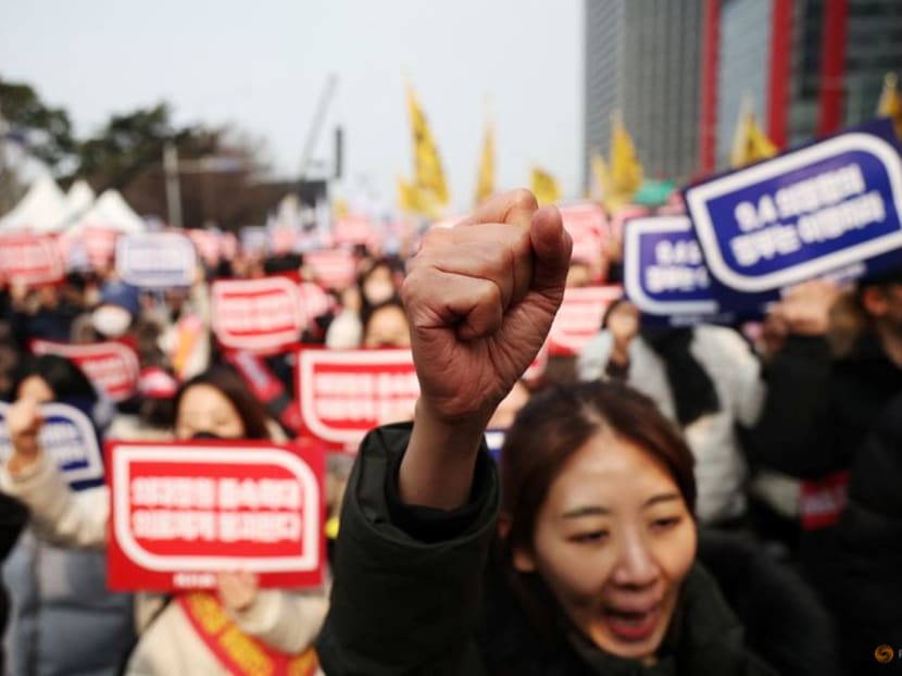 Doctors chant slogans during a rally to protest against government plans to increase medical school admissions in Seoul, South Korea, on March 3, 2024. Doctors chant slogans during a rally to protest against government plans to increase medical school admissions in Seoul, South Korea, on March 3, 2024.