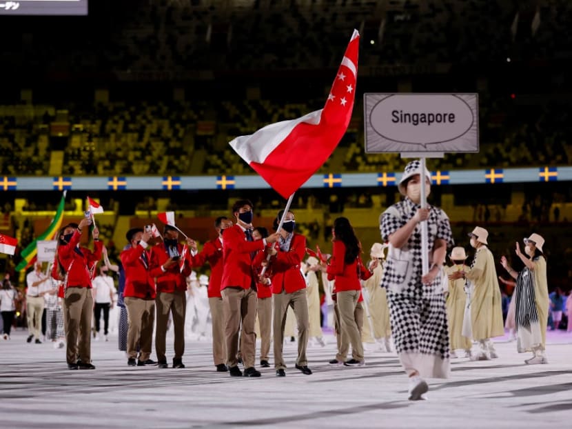 Singapore's athletes march into the stadium for the opening ceremony of the Tokyo Olympics on July 23, 2021.