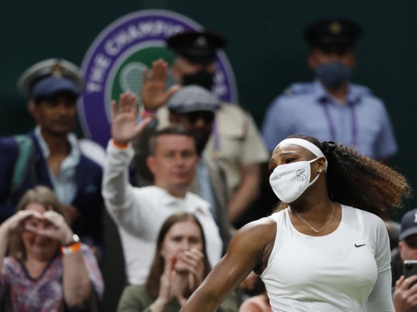 US tennis player Serena Williams leaves the court after withdrawing from her women's singles first round match against Belarus's Aliaksandra Sasnovich on the second day of the 2021 Wimbledon Championships at The All England Tennis Club in Wimbledon, southwest London, on June 29, 2021.