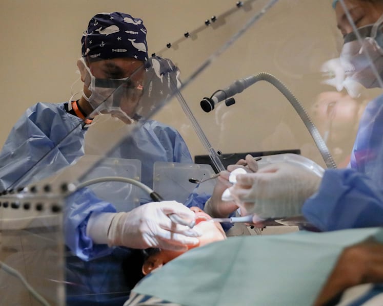 NUS researchers invent shield to limit spread of infectious diseases such as Covid-19 in dental procedures
