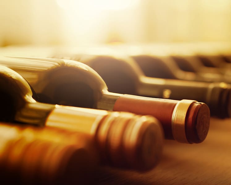 Man charged with misappropriating S$12 million from wine investment scheme