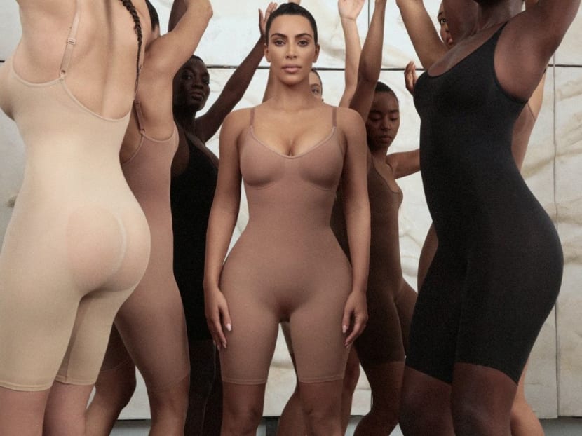 Kim Kardashian and models wear bodysuits from her new Kimono clothing line.