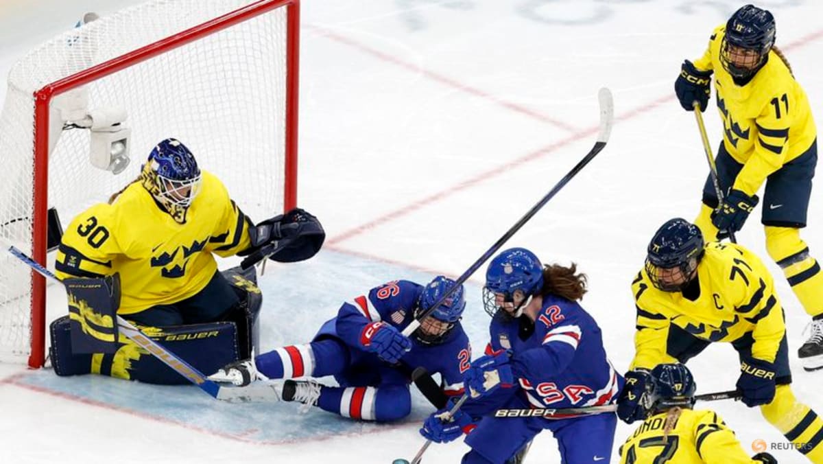 Ice hockey-Dominant US slam door on Sweden to reach women's final