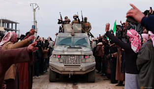 Syrian troops sweep northern towns as Kurdish fighters withdraw