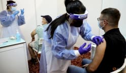 Malaysia eases COVID-19 curbs to allow home quarantine for fully vaccinated Malaysians, PRs