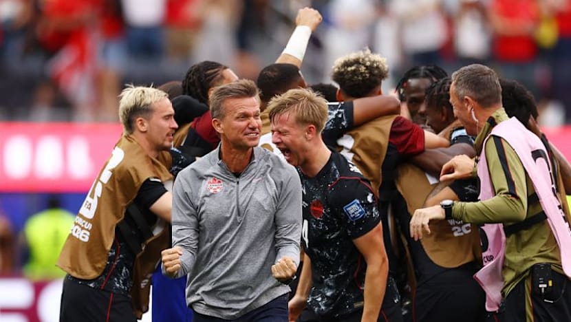 Canada score late winner to advance to last 16 at World Cup