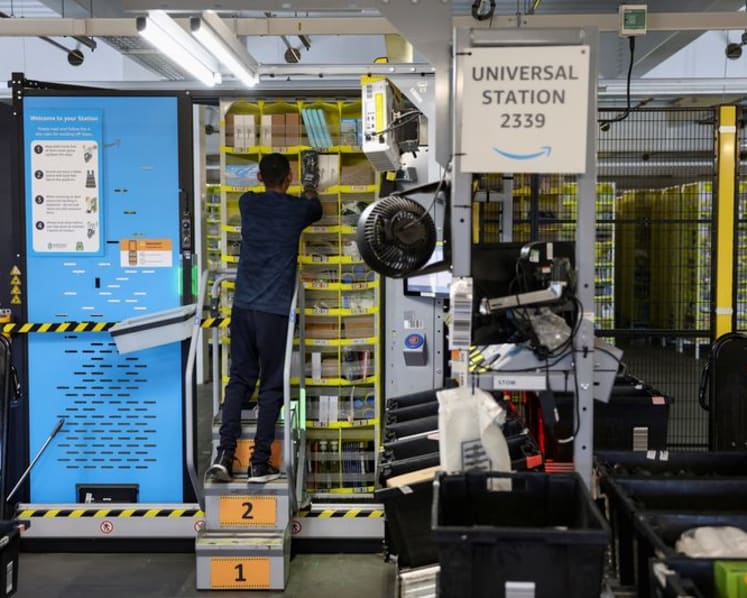Amazon unveils new AI warehouse robot in $12 billion Europe push