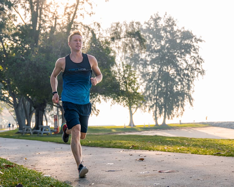 Briton breaks world record for longest triathlon by running, cycling and swimming 7,500km in Singapore
