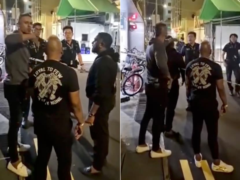 Screenshots of a video uploaded on Sept 22, 2024 showing three men allegedly taunting police officers at a crime scene in Little India. Screenshots of a video uploaded on Sept 22, 2024 showing three men allegedly taunting police officers at a crime scene in Little India.