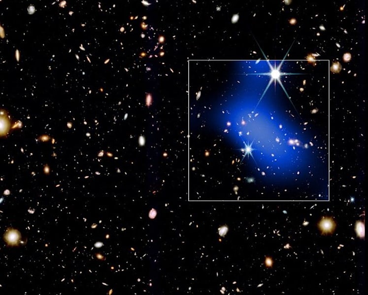 Galaxy cluster observed forming surprisingly early in universe's history