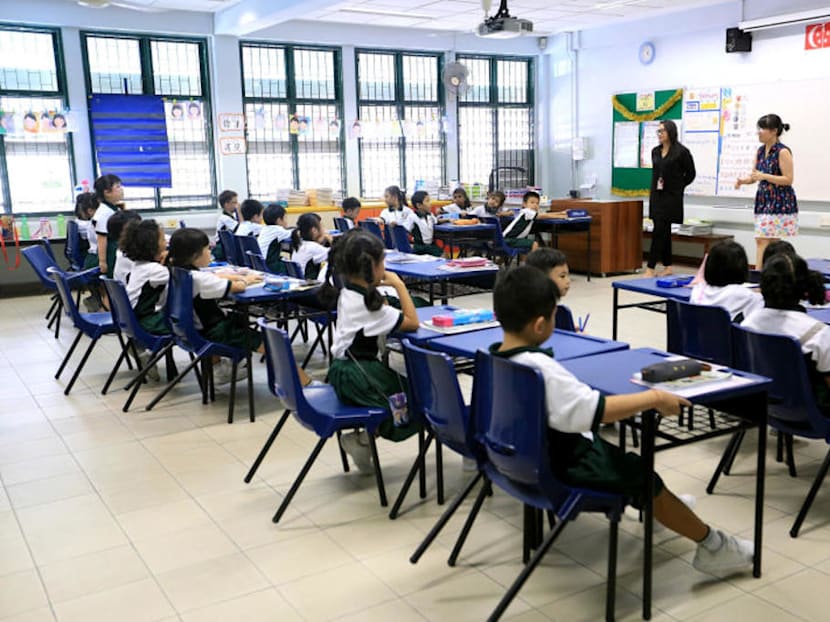 Offer dual-language textbooks in schools to spur use of mother-tongue languages