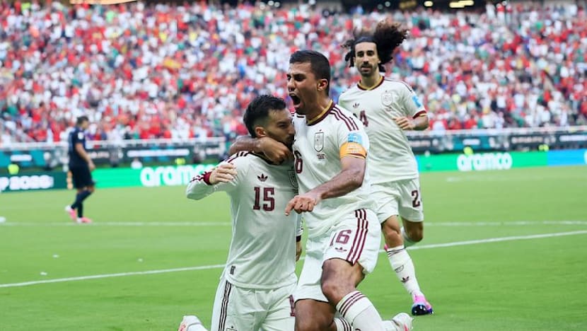 Baena strike sends Spain past Uruguay into World Cup knockouts