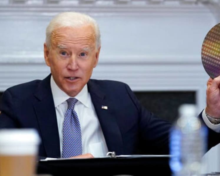 Biden tells execs US needs to invest, lead in computer chips