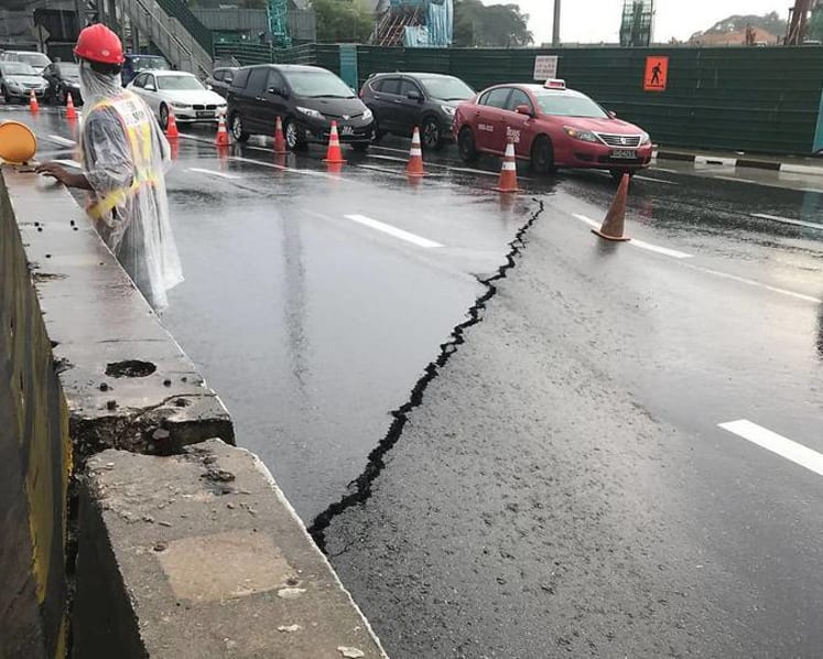 Cracks on Adam Road cause 'massive' traffic jams