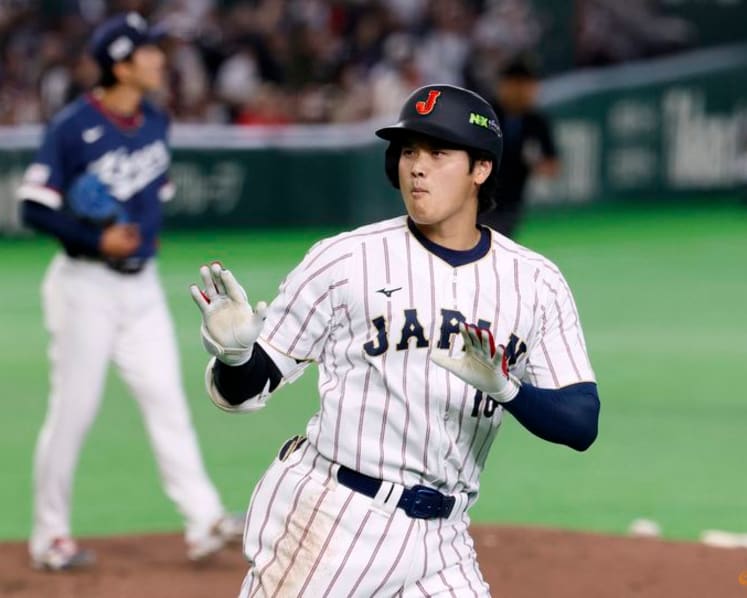 Baseball-Suzuki, Ohtani homers help Japan outlast South Korea