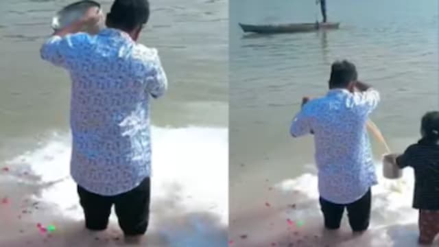 印度男子恒河倒奶祭祀  不让贫困女孩取奶惹争议