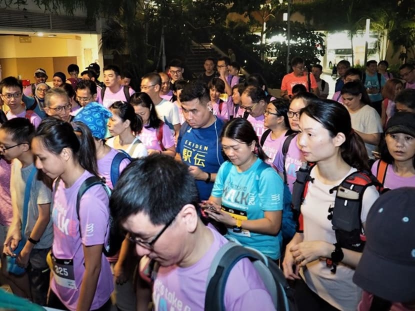 Participants of the 50km night walk being flagged off at the start point at Safra Punggol on Nov 2.