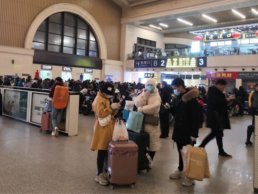 China coronavirus: With travel ban issued for Wuhan, many in city rush to escape