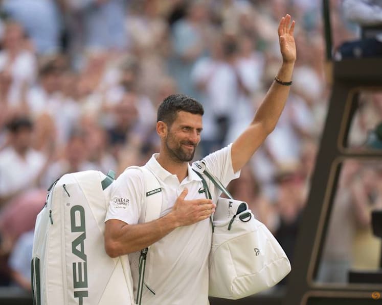 Defeated Djokovic says he wants 'at least one more time' at Wimbledon