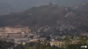 Hundreds flee across Thai border after attack on Myanmar military