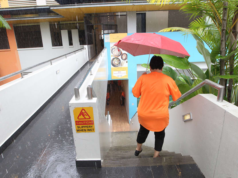 Rain brings relief to sweltering S’pore