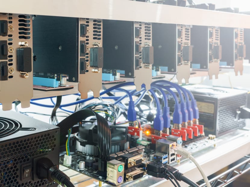 A crypto-mining rig (pictured) uses hardware to solve equations that validate cryptocurrency transactions, but the equipment uses a lot of energy and releases a lot of heat in doing so. A crypto-mining rig (pictured) uses hardware to solve equations that validate cryptocurrency transactions, but the equipment uses a lot of energy and releases a lot of heat in doing so.
