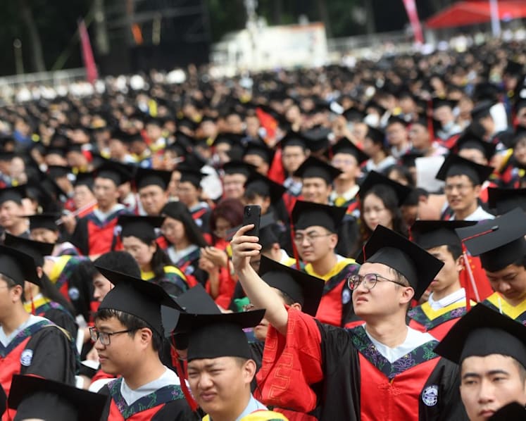 Chinese universities clamp down on AI-generated content, as record graduation season starts 