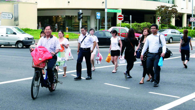 Using mobile phones while crossing roads not an offence: Police