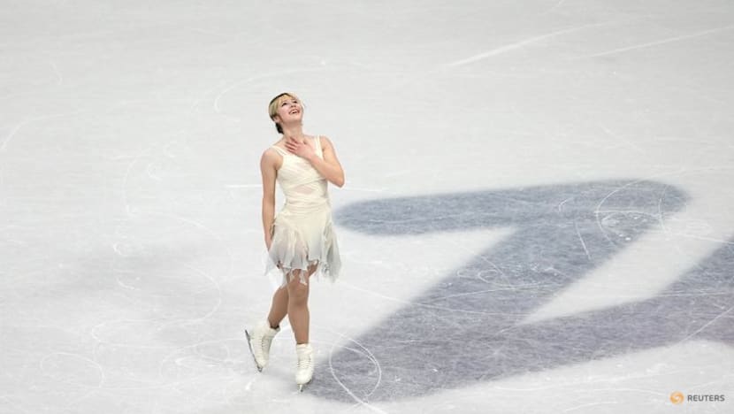 Figure skating-Liu shines while Glenn suffers heartbreak in Milan