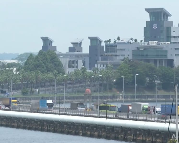 Driver accused of taking photos, videos at Woodlands Checkpoint to plead guilty, unaware it was 'so serious' 