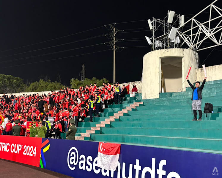 One man in the away stand: In a sea of Vietnamese support, a Singaporean stood rooting for the Lions