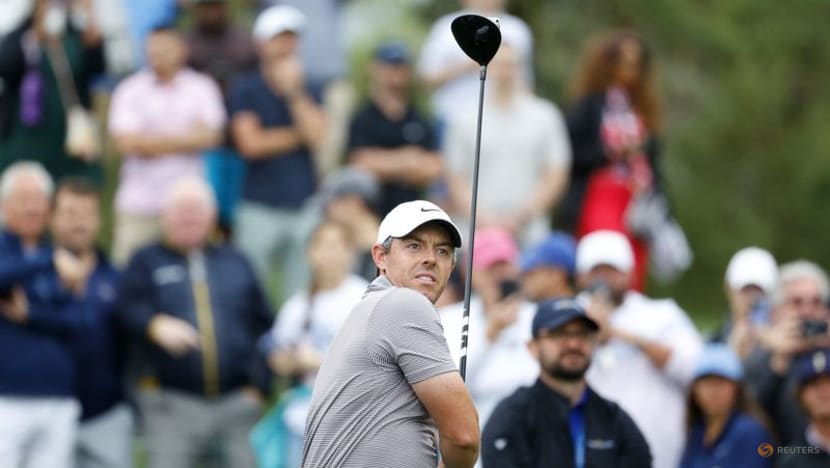 Rory McIlroy defeats J.J. Spaun in playoff for second Players title