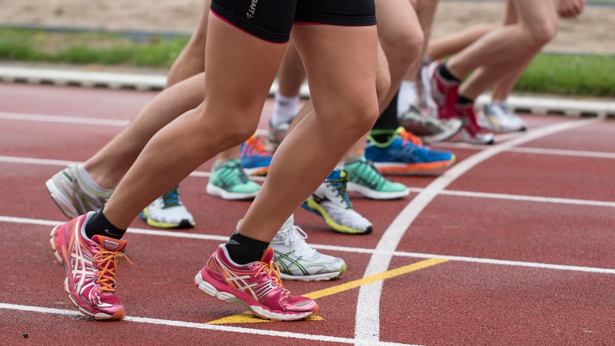 Sports shoes used by athletes on tracks on sale