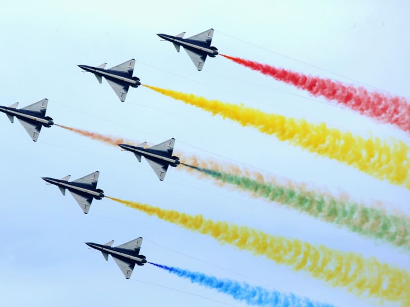 J-10 fighter planes from China's People's Liberation Army Air Force perform during the Singapore Airshow 2020 at Changi Exhibition Centre on Feb 16, 2020.