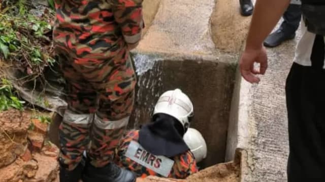 疑登山遇洪水 马国女跌入涵洞溺毙