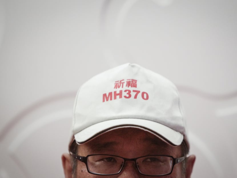 Li Hua, 58,  a Chinese family member of a passenger onboard the missing Malaysia Airlines flight MH370 looks on during a press conference at a hotel in Kuala Lumpur, Malaysia. Photo: AP
