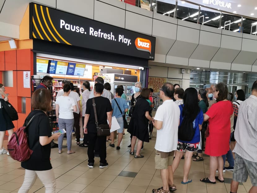 People waiting for the sale of surgical masks to start at Buzz convenience stores on Feb 20, 2020, were turned away at the last minute because Singapore Press Holdings, which owns the stores, decided to donate the masks to charities instead. People waiting for the sale of surgical masks to start at Buzz convenience stores on Feb 20, 2020, were turned away at the last minute because Singapore Press Holdings, which owns the stores, decided to donate the masks to charities instead.