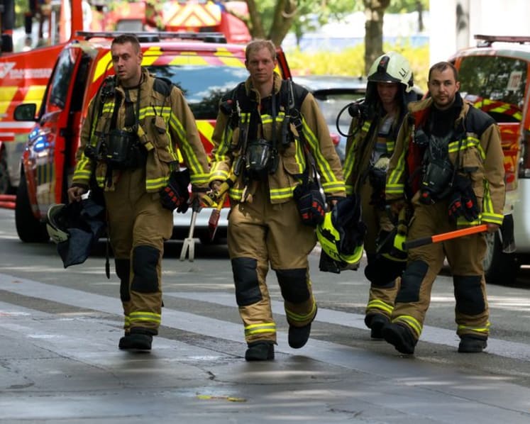 At least 5 people killed in fire in Antwerp apartment tower, Belgian police say