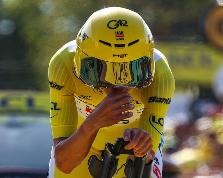 Evenepoel wins time trial to cut Pogacar's lead