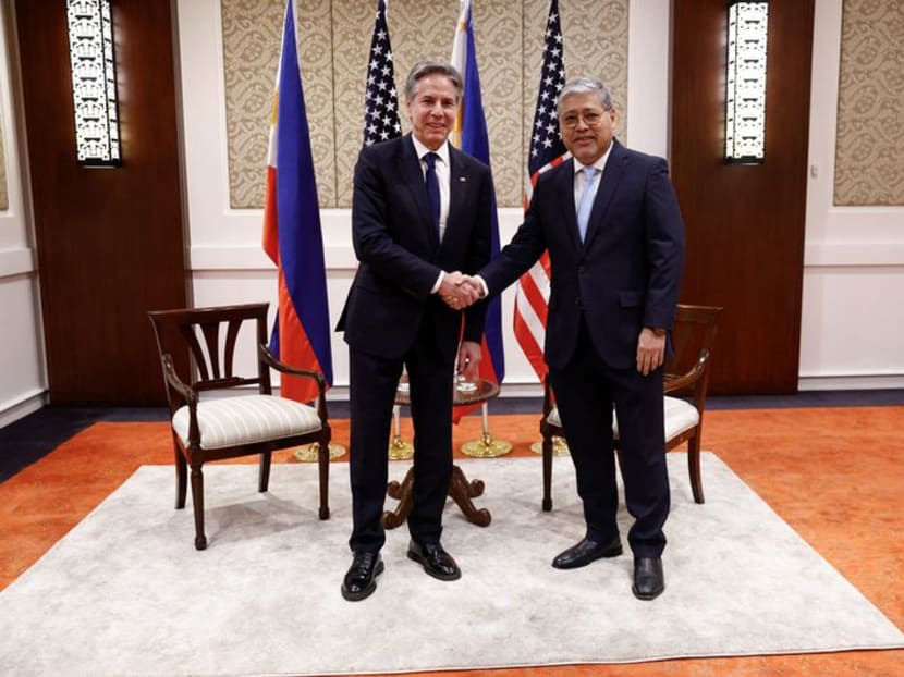 US Secretary of State Antony Blinken shakes hands with Philippines' Secretary of Foreign Affairs Enrique Manalo, at the Sofitel Hotel in Manila, Philippines, on March 19, 2024.