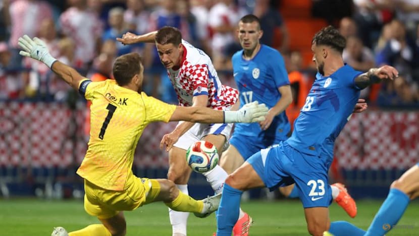 Croatia head to World Cup on high after late 2-1 win over Slovenia