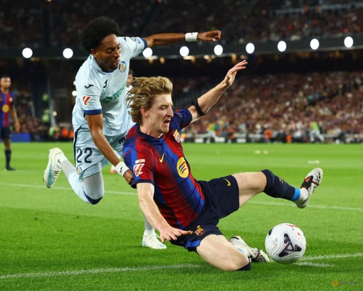 Barcelona cruise past Getafe to maintain perfect start