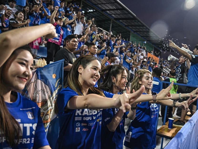 This photo taken on March 9, 2024 shows Rabbit Girls in the stands undertaking cheerleading duties during BG Pathum United FC's Thai League 1 football match against Sukhothai at BG Stadium in Pathum Thani. 