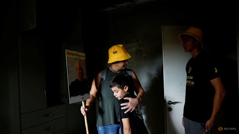 Israel buries two slain hostages recovered from Gaza Israel buries two slain hostages recovered from Gaza