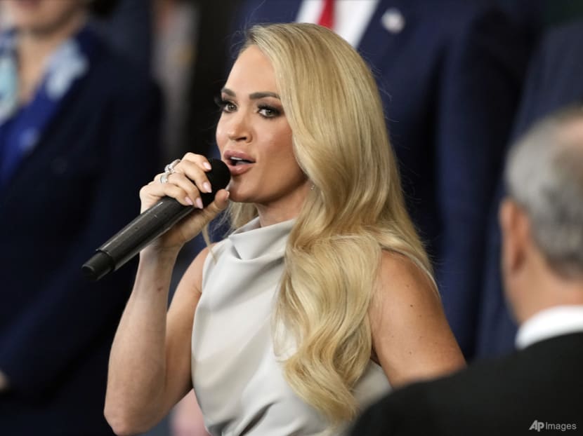 Country music star Carrie Underwood sings a cappella at US President Donald Trump's inauguration after technical glitch